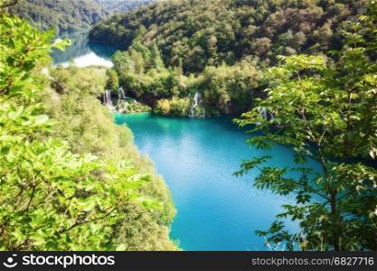 Beautiful summer forest, lake and waterfall. Plitvice National Park, Croatia.