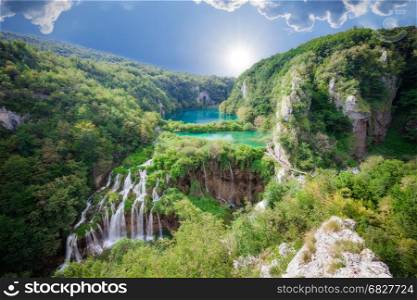 Beautiful summer forest, lake and waterfall. Plitvice National Park, Croatia.