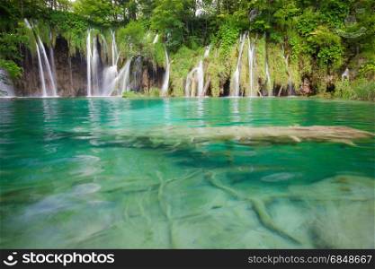 Beautiful summer green forest waterfall. Plitvice National Park, Croatia.