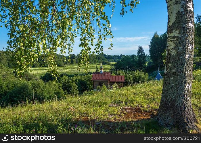 Beautiful summer landscape with a chapel at the Holy source of St. Leontius, Mikhailovskoye village, Ivanovo region, Russia.