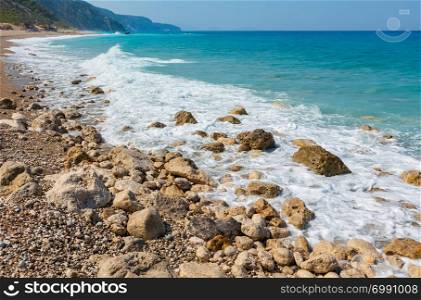 Beautiful summer Lefkada coast stony beach, Greece, Ionian Sea