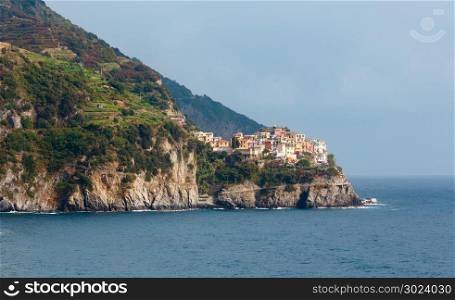 Beautiful summer Manarola view from Corniglia village. This is a famous villages of Cinque Terre National Park in Liguria, Italy. People are unrecognizable.