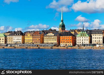 Beautiful summer scenery of the Old Town (Gamla Stan) pier and skyline in Stockholm, Sweden