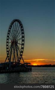 Beautiful summer sunset behind the Capital Wheel, National Harbor?s most iconic attraction