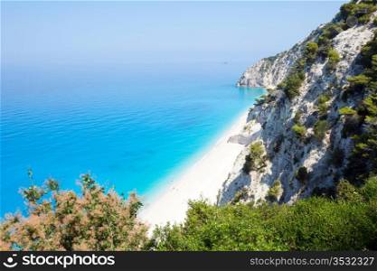 Beautiful summer white Egremni beach on Ionian Sea (Lefkada, Greece) summer view from nearest rock