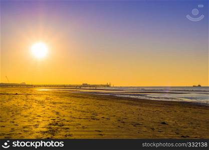 beautiful sun shining bright at the beach of blankenbergen, Belgium, beautiful nature background