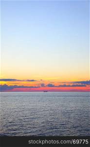 Beautiful sundown over Baltic Sea - seascape with sea horizon. Background and space for your own text