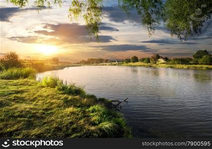 Beautiful sundown over the river in summer