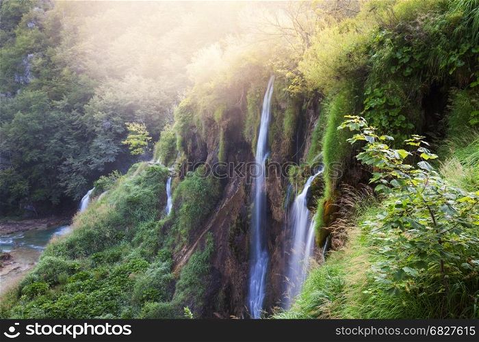 Beautiful sunny tropical waterfalls. Nature paradise