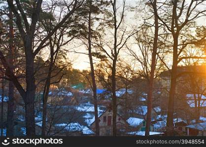 Beautiful sunrise in a winter small town in Kiev suburb. Ukraine