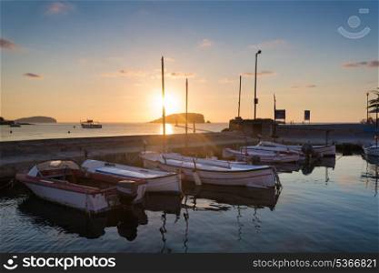 Beautiful sunrise landscape seascape of boats in harbourin Mediterranean Sea