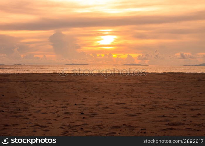 beautiful sunrise on beach and tropical sea in summer