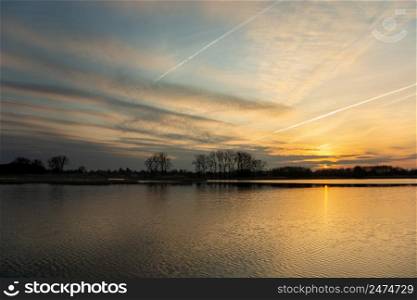 Beautiful sunset and clouds over the lake, Stankow, Poland