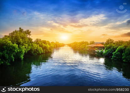 Beautiful sunset at river on evening in background nature for your texture concept or design,Beauty nature in Thailand