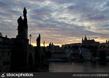 beautiful sunset at the Charles bridge in Prague