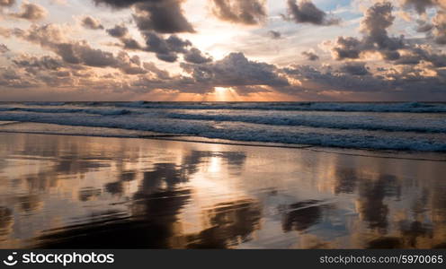 Beautiful sunset at Vale Figueiras beach in Portugal