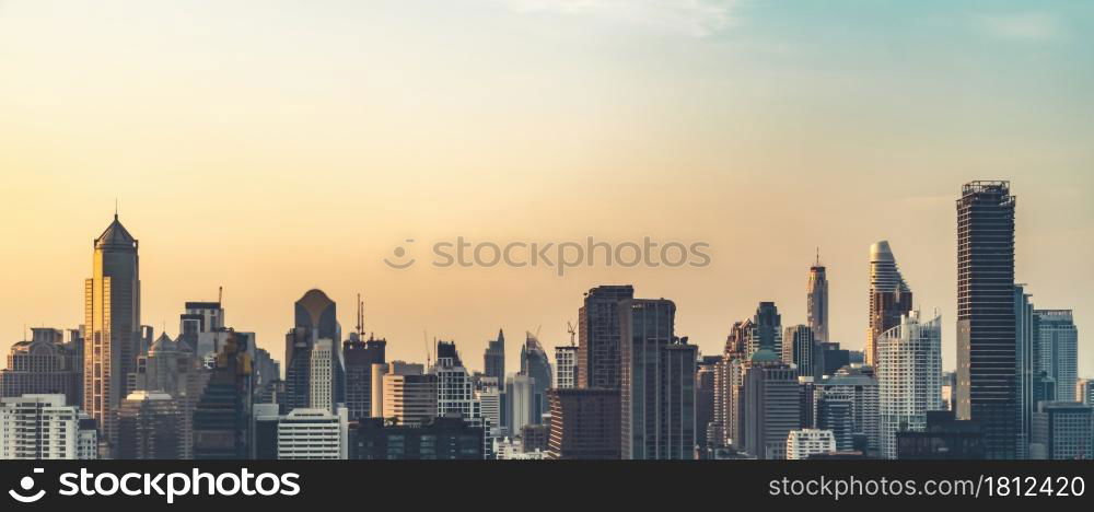 Beautiful sunset cityscape and high-rise buildings in metropolis city center . Downtown business district in panoramic view .. Beautiful sunset cityscape and high-rise buildings in metropolis city center