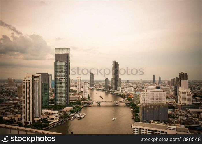 Beautiful sunset cityscape and high-rise buildings in metropolis city center . Downtown business district in panoramic view .. Beautiful sunset cityscape and high-rise buildings in metropolis city center