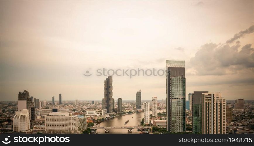Beautiful sunset cityscape and high-rise buildings in metropolis city center . Downtown business district in panoramic view .. Beautiful sunset cityscape and high-rise buildings in metropolis city center