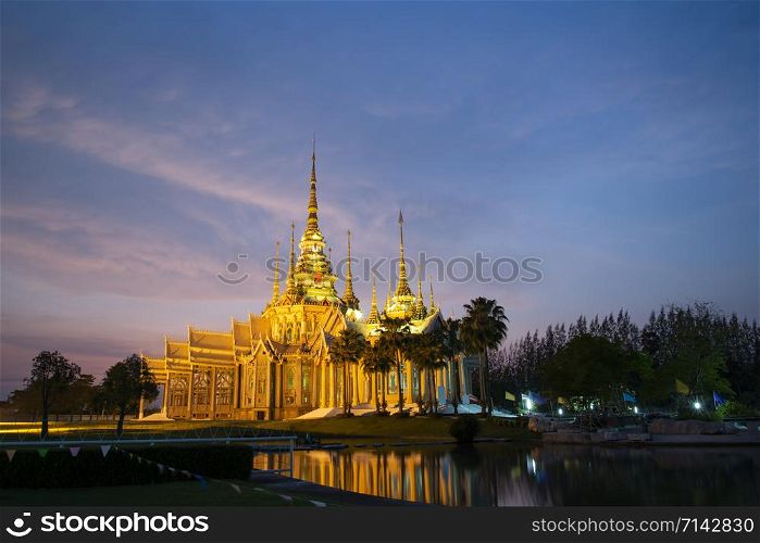 beautiful sunset golden temple thailand colorful sky twilight - Landmark Nakhon Ratchasima province temple at Wat None Kum in Thailand