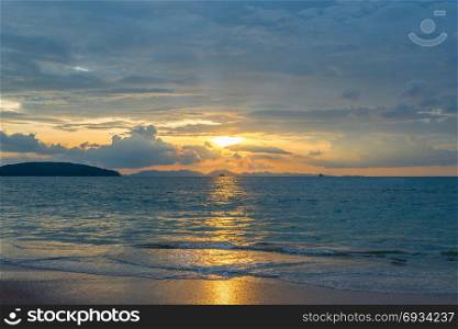 beautiful sunset in Krabi Thailand - sunset in orange colors over the Andaman Sea