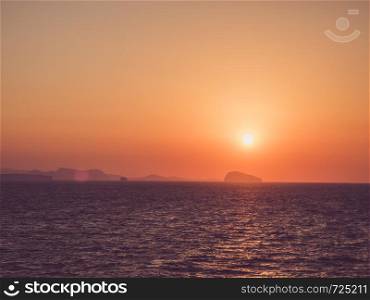 Beautiful sunset in the sea. View from a cruise liner. Concept of leisure and travel. Beautiful sunset in the sea. Leisure and travel