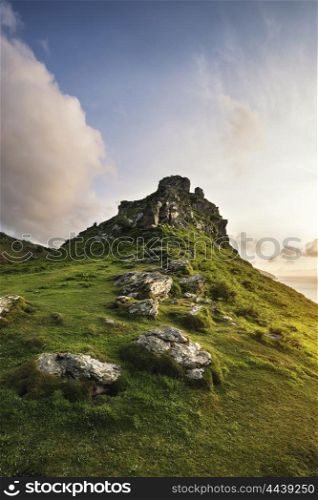 Beautiful sunset landscape image of Valley of The Rocks in Devon England