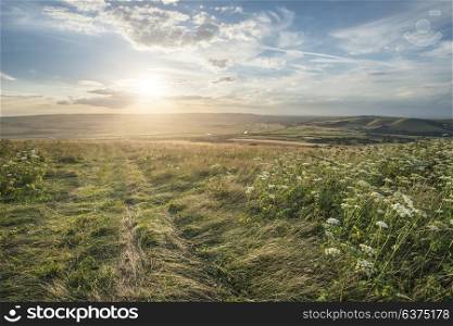 Beautiful sunset landscape image over English rolling countryside