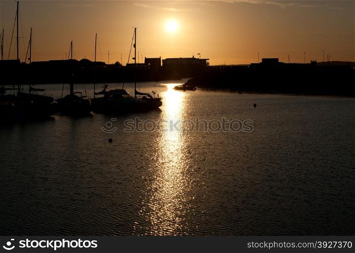 Beautiful sunset on the peaceful harbor at Howth, Dublin, Ireland