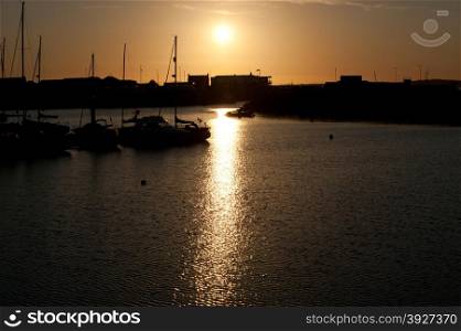 Beautiful sunset on the peaceful harbor at Howth, Dublin, Ireland