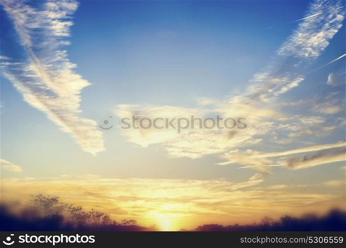 Beautiful sunset or dawn sky background with amazing clouds and Sunshine, outdoor landscape