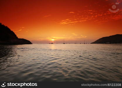 Beautiful sunset over sea. Beautiful sunset over sea and boats in Thailand