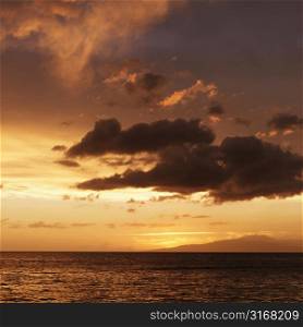 Beautiful sunset over the Pacific ocean near Maui Hawaii.
