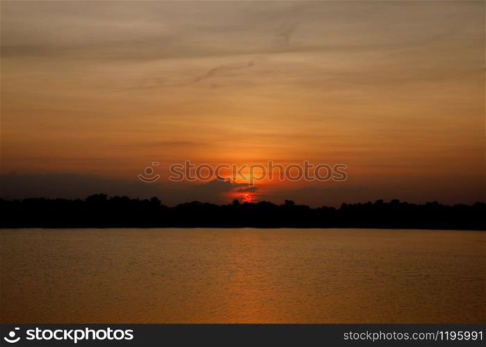 Beautiful sunset over the reservoir Sky background sunset