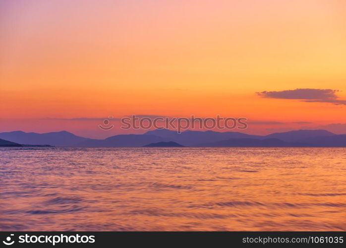 Beautiful sunset over the sea and islands - Landscape - seascape. May be used as background