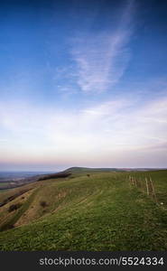 Beautiful sunset sky over countryside landscape in Summer