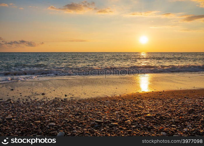 Beautiful sunset view of breaking waves at Petra tou Romiou beach, in Paphos, Cyprus. It is considered to be Aphrodite&rsquo;s birthplace in Greek mythology.