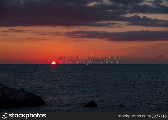 Beautiful sunset view of the beach around Petra tou Romiou, in Paphos, Cyprus. It is considered to be Aphrodite&rsquo;s birthplace in Greek mythology.