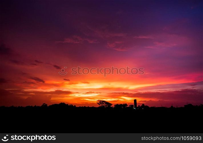 Beautiful sunset with blue sky and clouds background.
