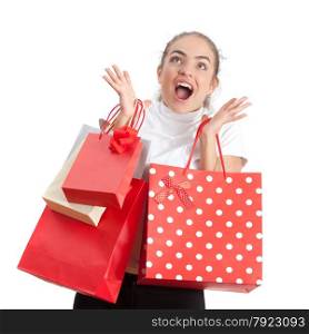 Beautiful Surprised Happy Young Woman Holding Shopping Bags and Looking Away. Red and White Colors.