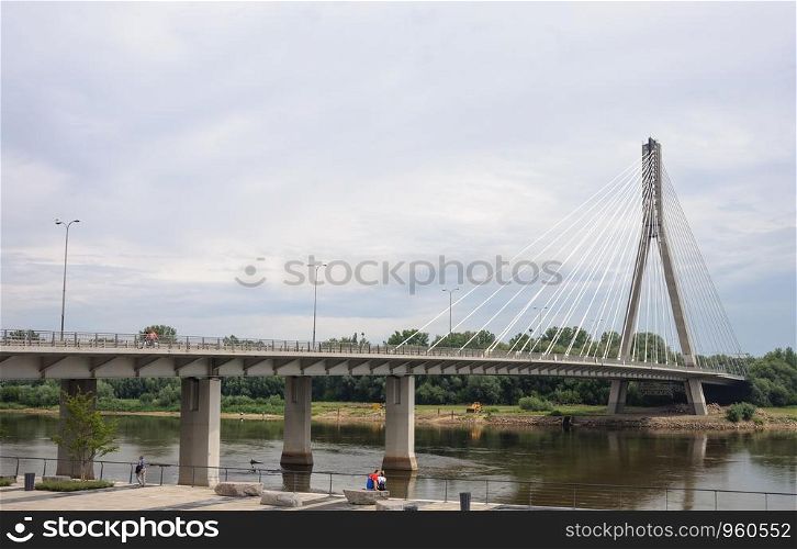 Beautiful Swietokrzyski bridge on Vistula river in Warsaw, Poland