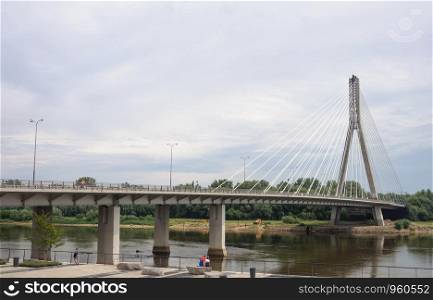 Beautiful Swietokrzyski bridge on Vistula river in Warsaw, Poland
