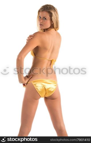 Beautiful tall blonde woman in a yellow bikini