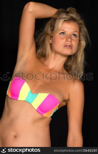 Beautiful tall German blonde in a striped bikini