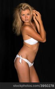 Beautiful tall German blonde in a white bandeau bikini