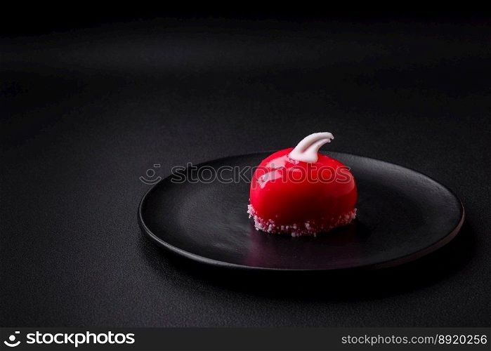 Beautiful tasty cake red color cheesecake in the shape of a heart. Sweets for Valentine’s Day