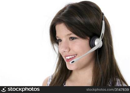 Beautiful teen girl with headset and big smile over white. Great for teen hotline or just gossiping with friends.