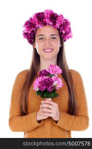 Beautiful teenager girl with purple flowers in her head and a bouquet isolated on a white background