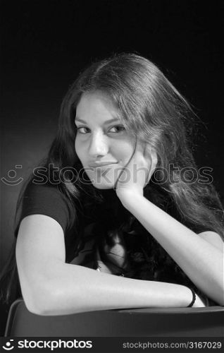 Beautiful teenager shot in the studio in black & white