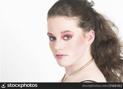 Beautiful teenager with pink make-up
